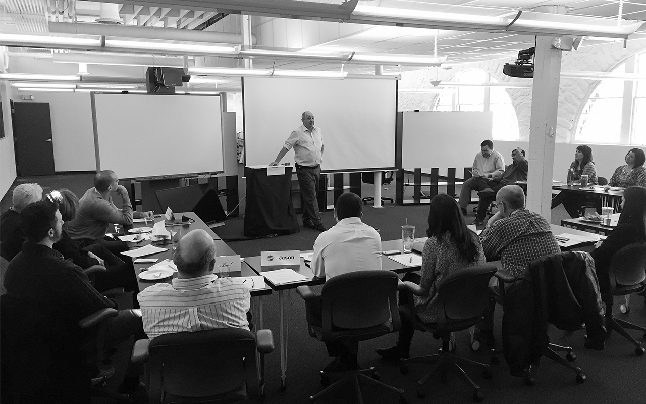 people listening in conference room