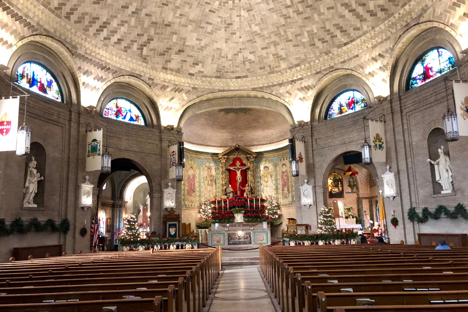 The Basilica of St. Lawrence, designed by Spanish architect Rafael Guastavino and built in 1905, is located at the corner of Haywood Street and Flint Street in Asheville, North Carolina. Featuring a large elliptical masonry dome, the Spanish Baroque-style building features many ornate details, and was elevated to the status of minor basilica in 1993.
