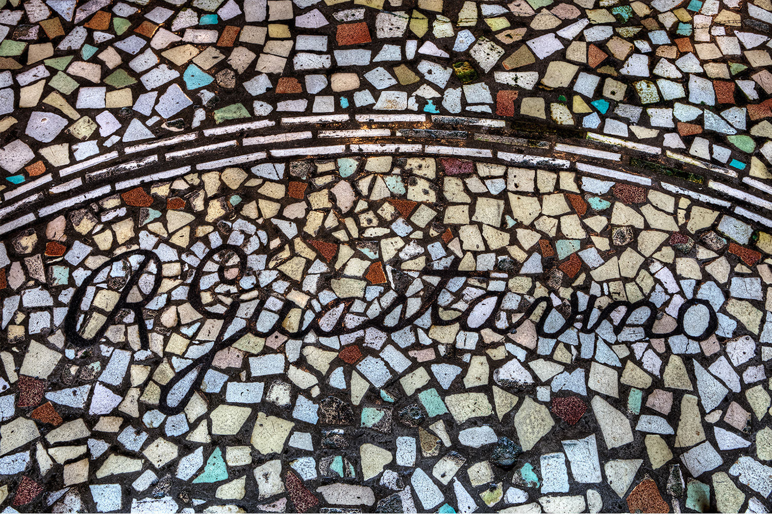 The lobby floor still boasts of Guastavino with his signature amongst broken tiles originally produced in his factory.