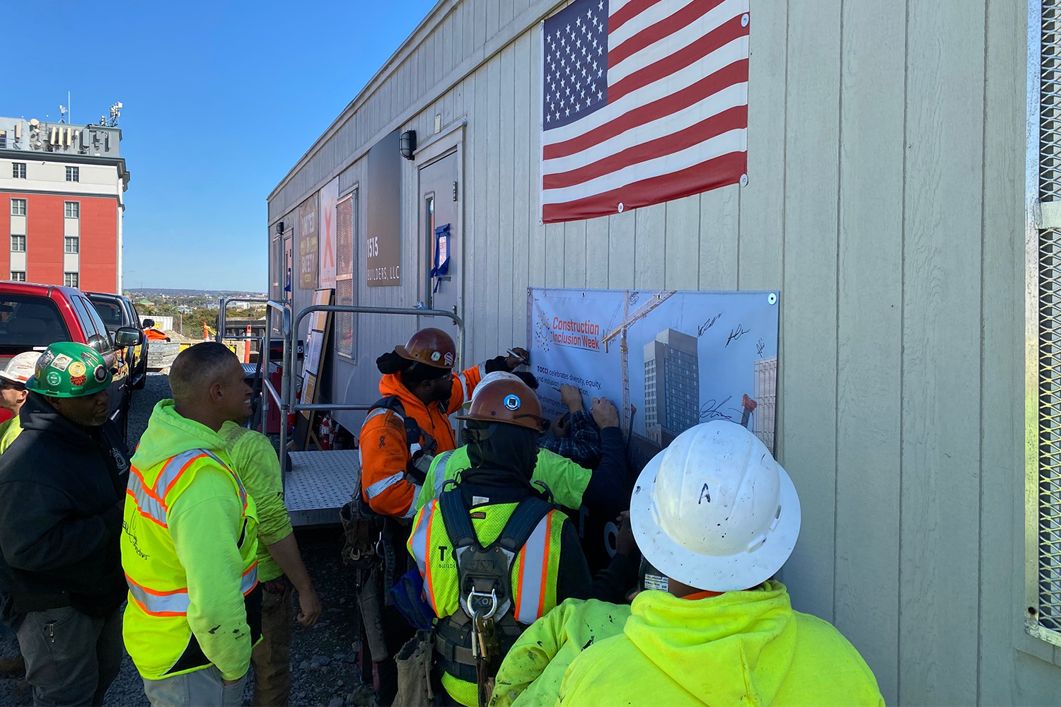 TOCCI staff and subcontractors sign the Culture of CARE pledge at a Brighton jobsite