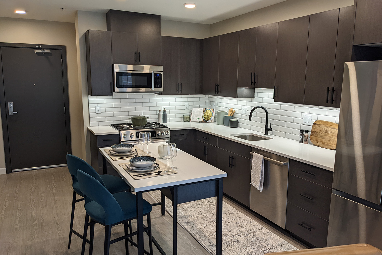 Stocked kitchen space in a Flats on First unit