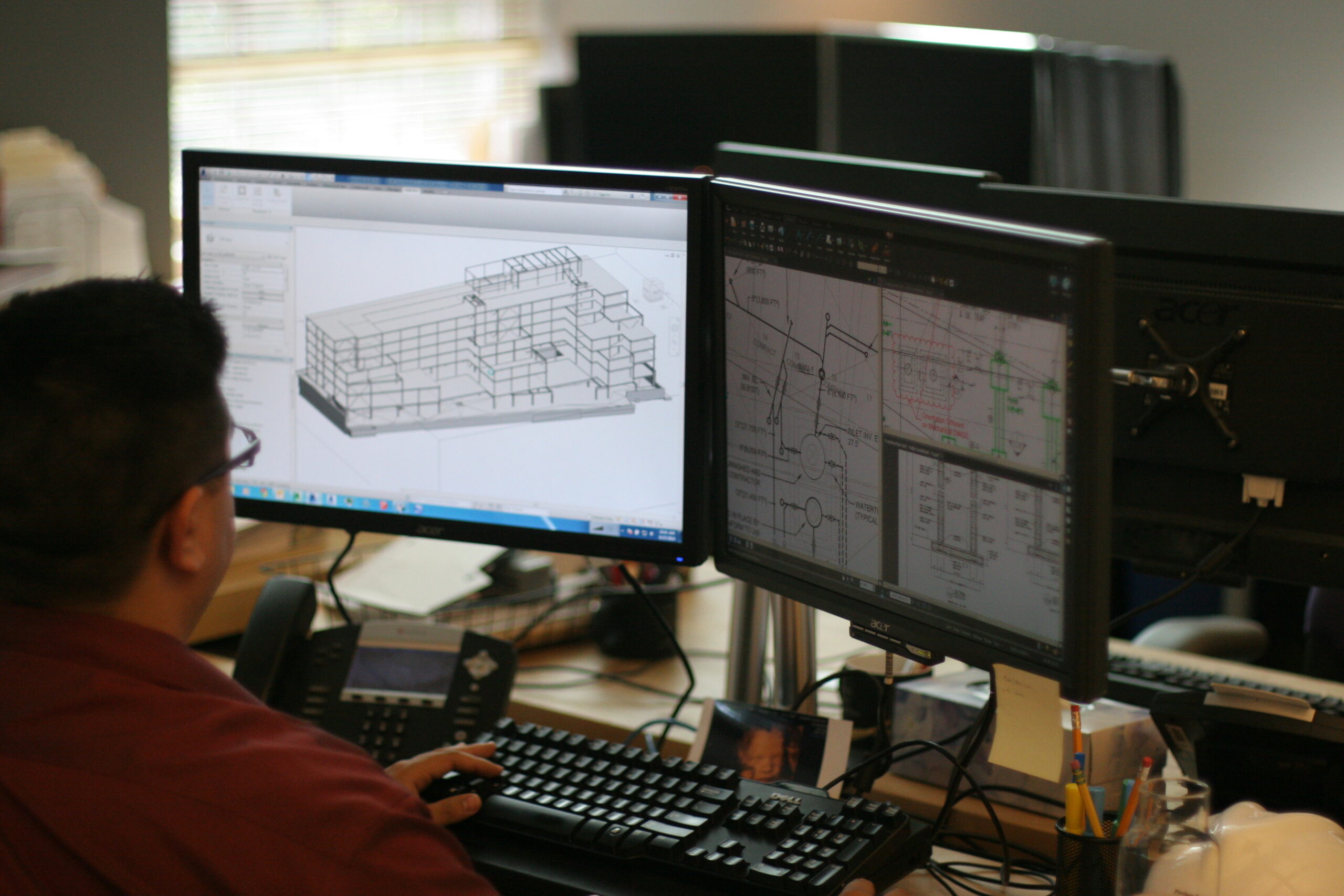 man in front of computer using BIM tech 