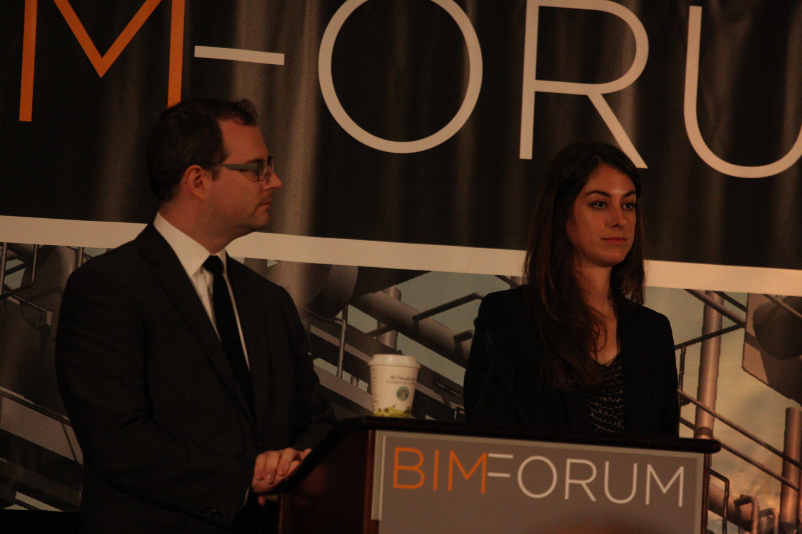 Pierce Reynoldson and Kristen Tomilson delivering speech at 2011 BIMForum conference in Chicago 
