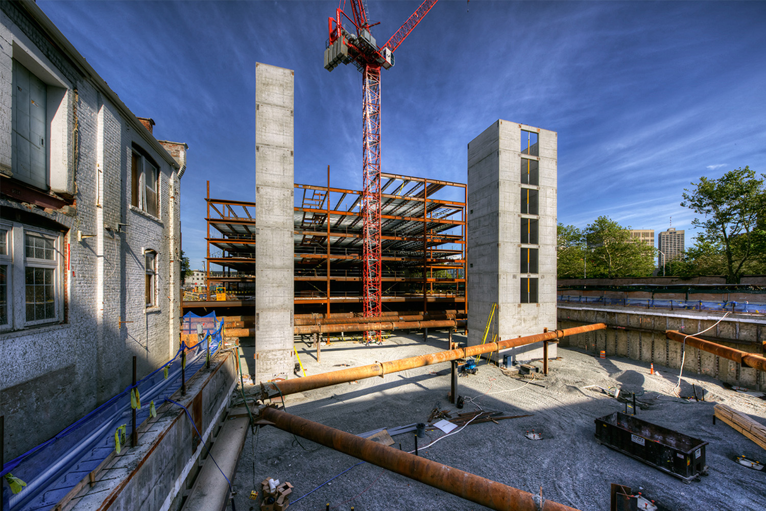 construction at 225 Binney Street, with several metal beams laying around