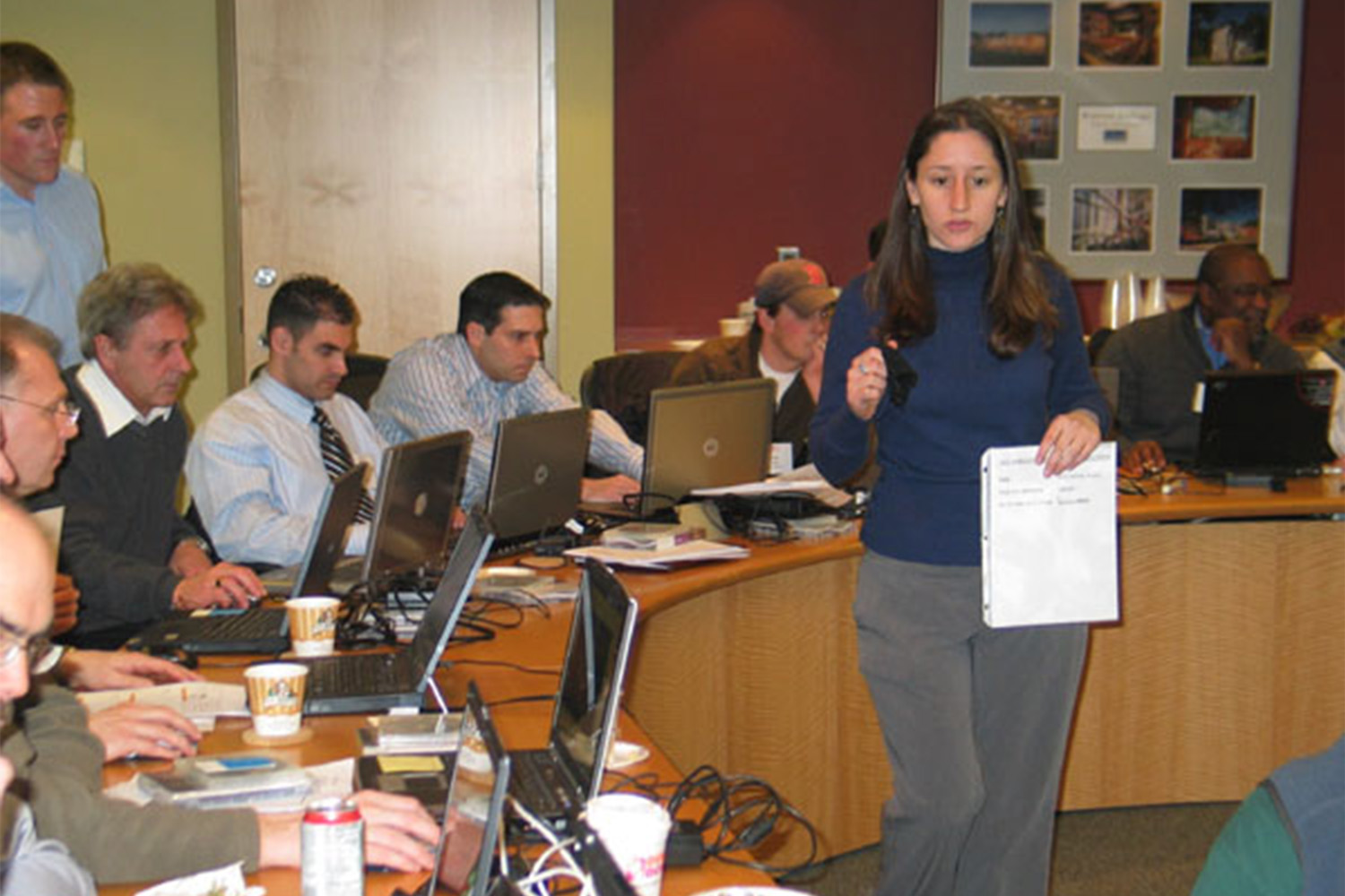 Laura handler delivering a presentation to an audience