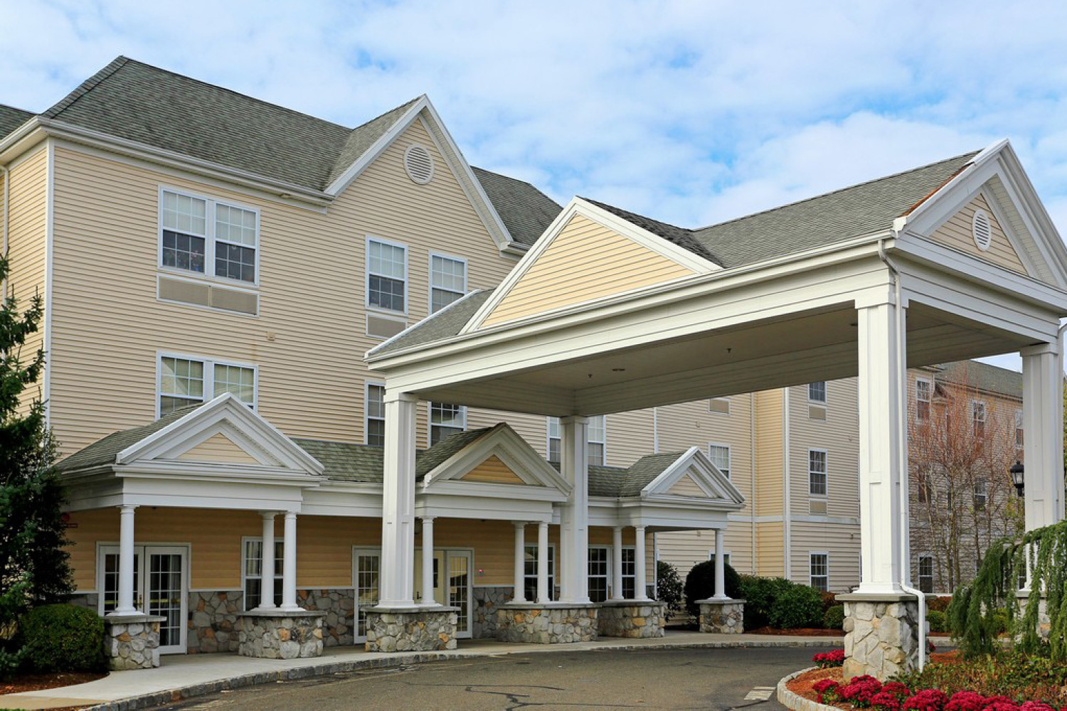 Side view of entrance - overhead over driveway near entrance