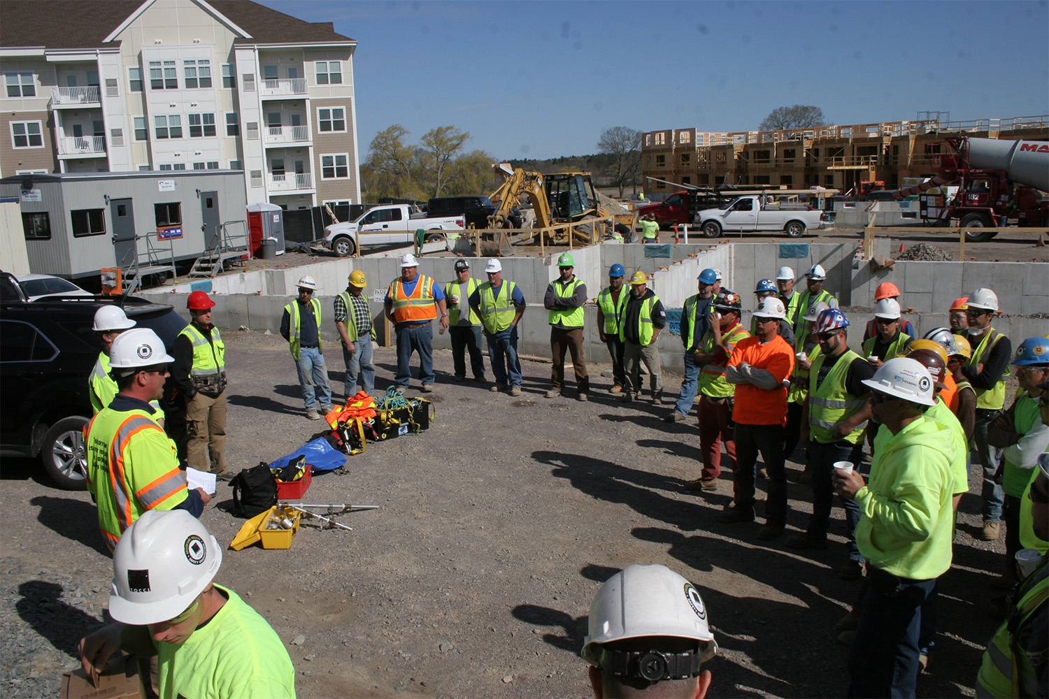 The group listens to Chuck talk about safety.