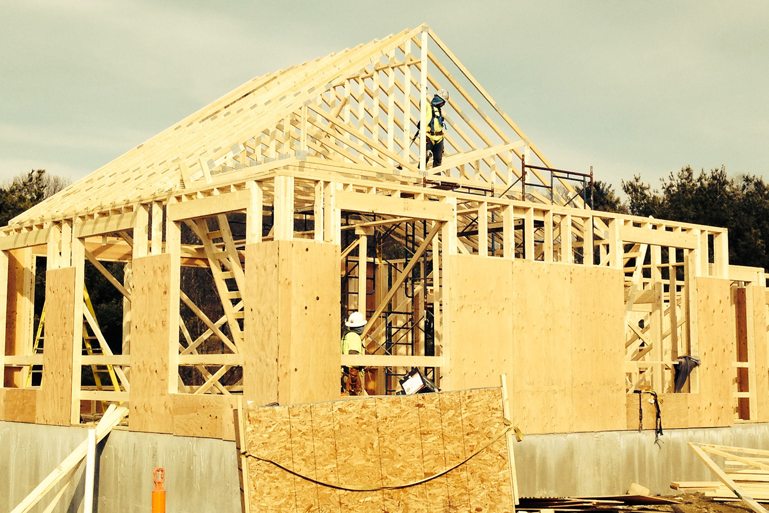 Wooden frames being put into place for a house