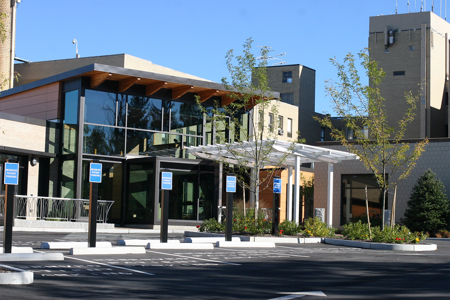 View of Marlborough Hospital entrance, seen from across parking lot 