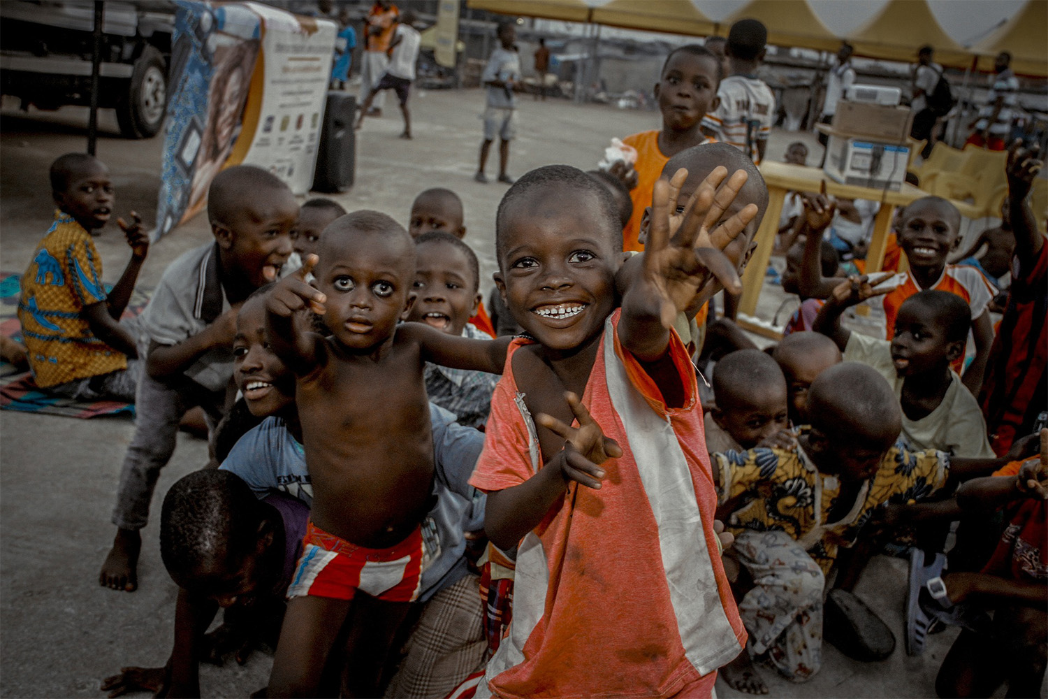 several African children smiling and laughing