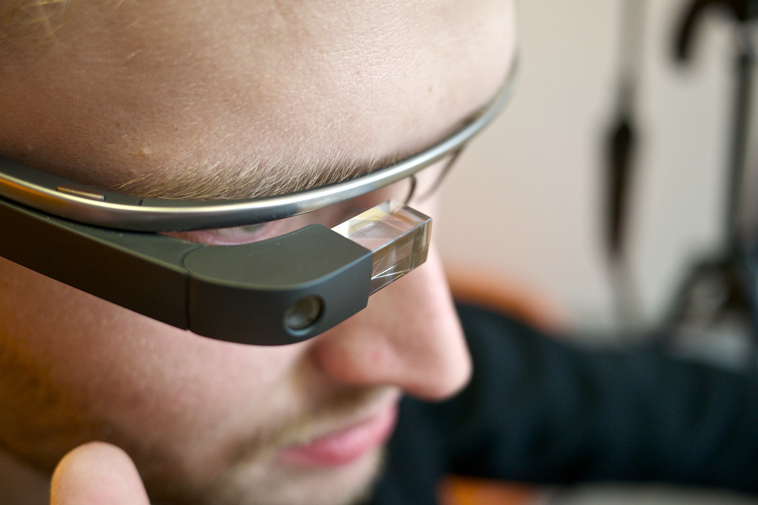 A man wearing a pair of Google Glasses 