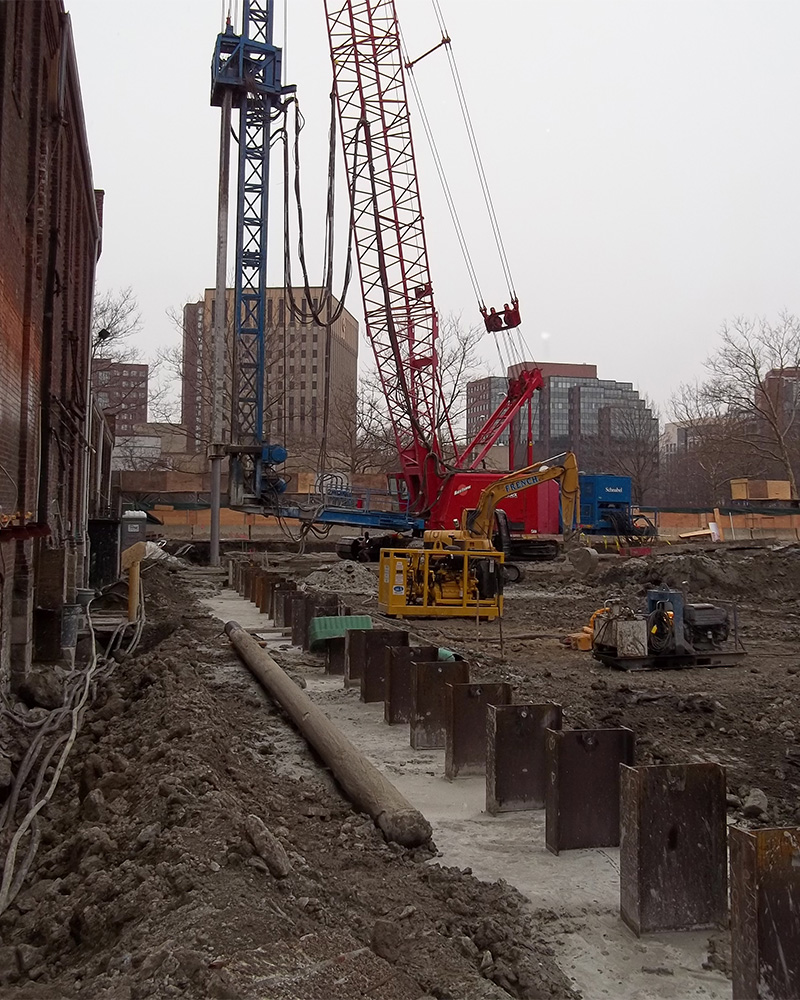 outside view of soil mix wall, with soldier piles 