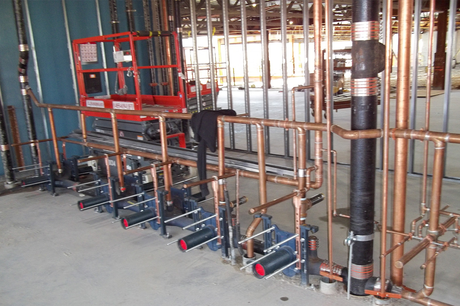 copper piping layout in toilet room