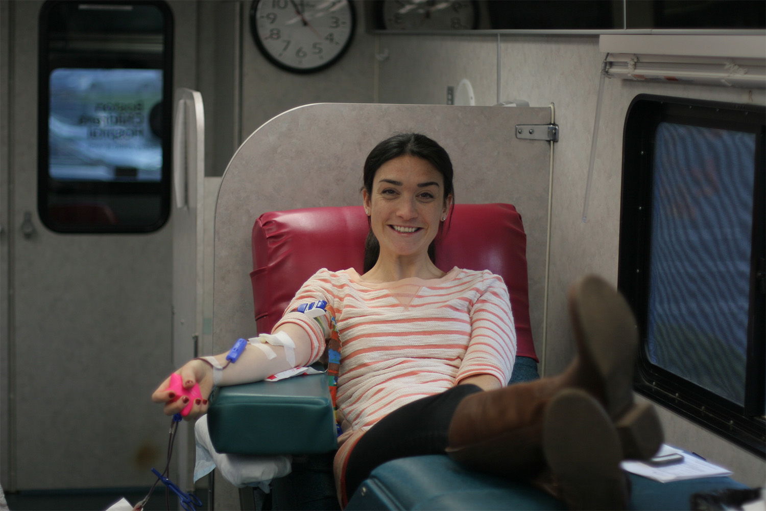 Katie our blood drive organizer prepares for her turn to donate.
