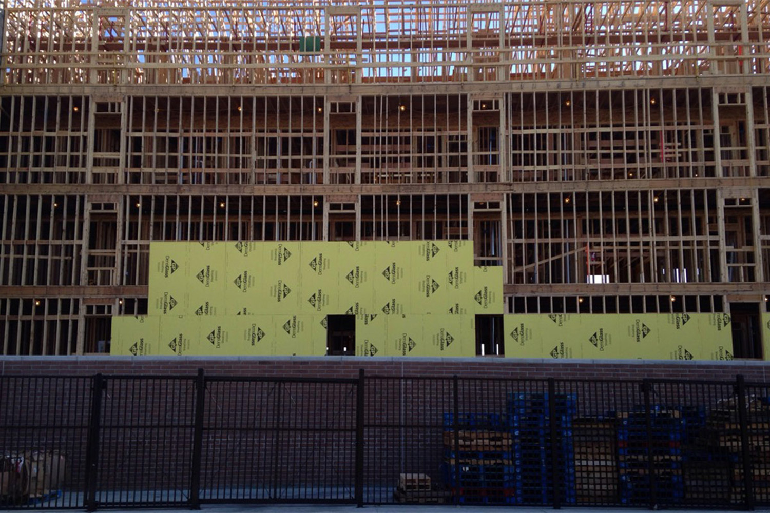 frontal view of building frame, composed of wooden beams
