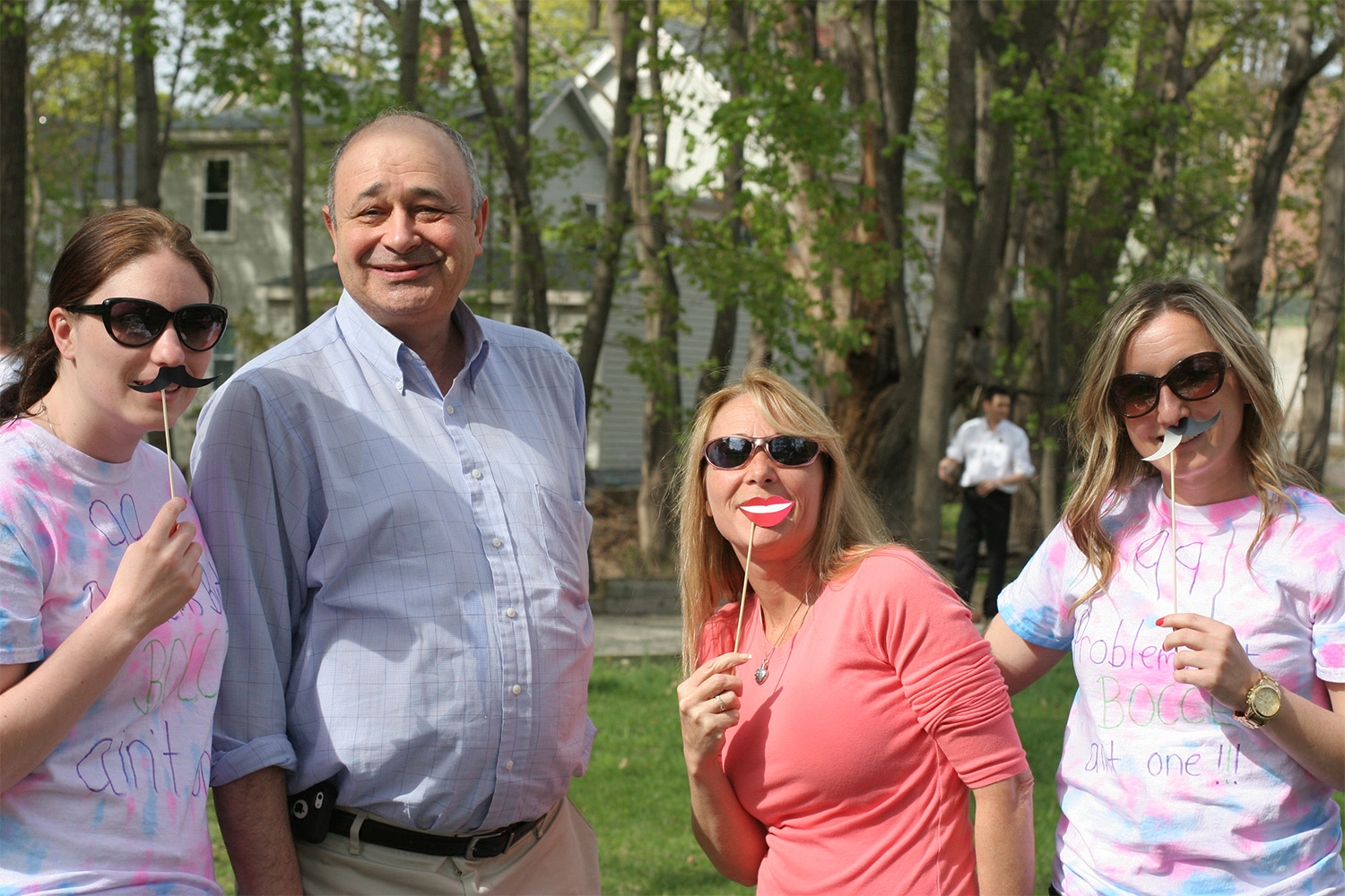 The winners of the season opener (left) Melissa and (right) Maria pose with Victor and Joann.