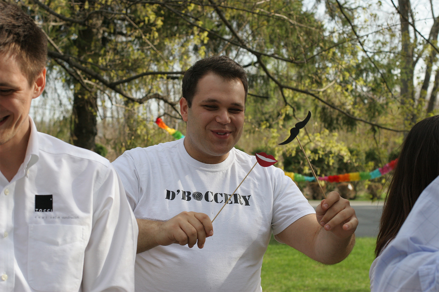 Tocci employee wearing shirt that says "deboccery"
