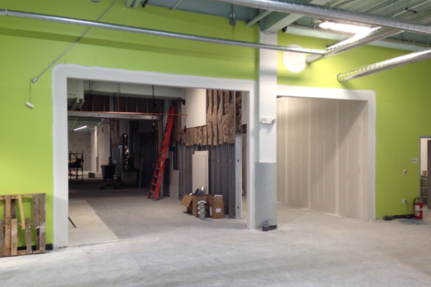 2 entryways with green walls