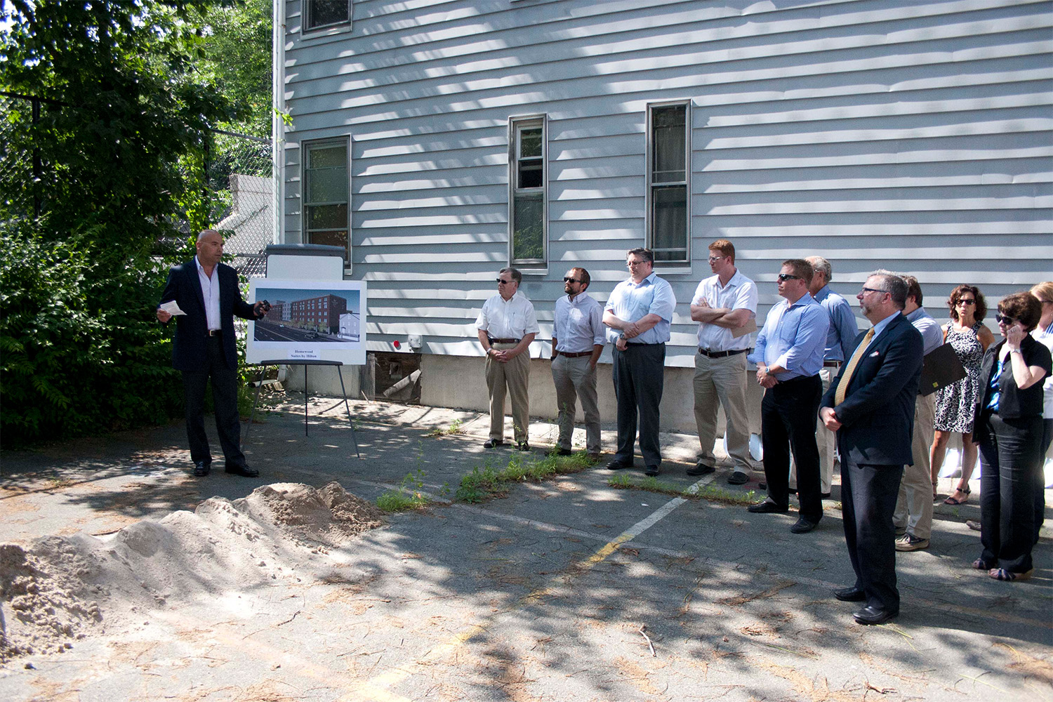 man addressed the crowd over at the groundbreaking for the Hilton hotel in Brookline 