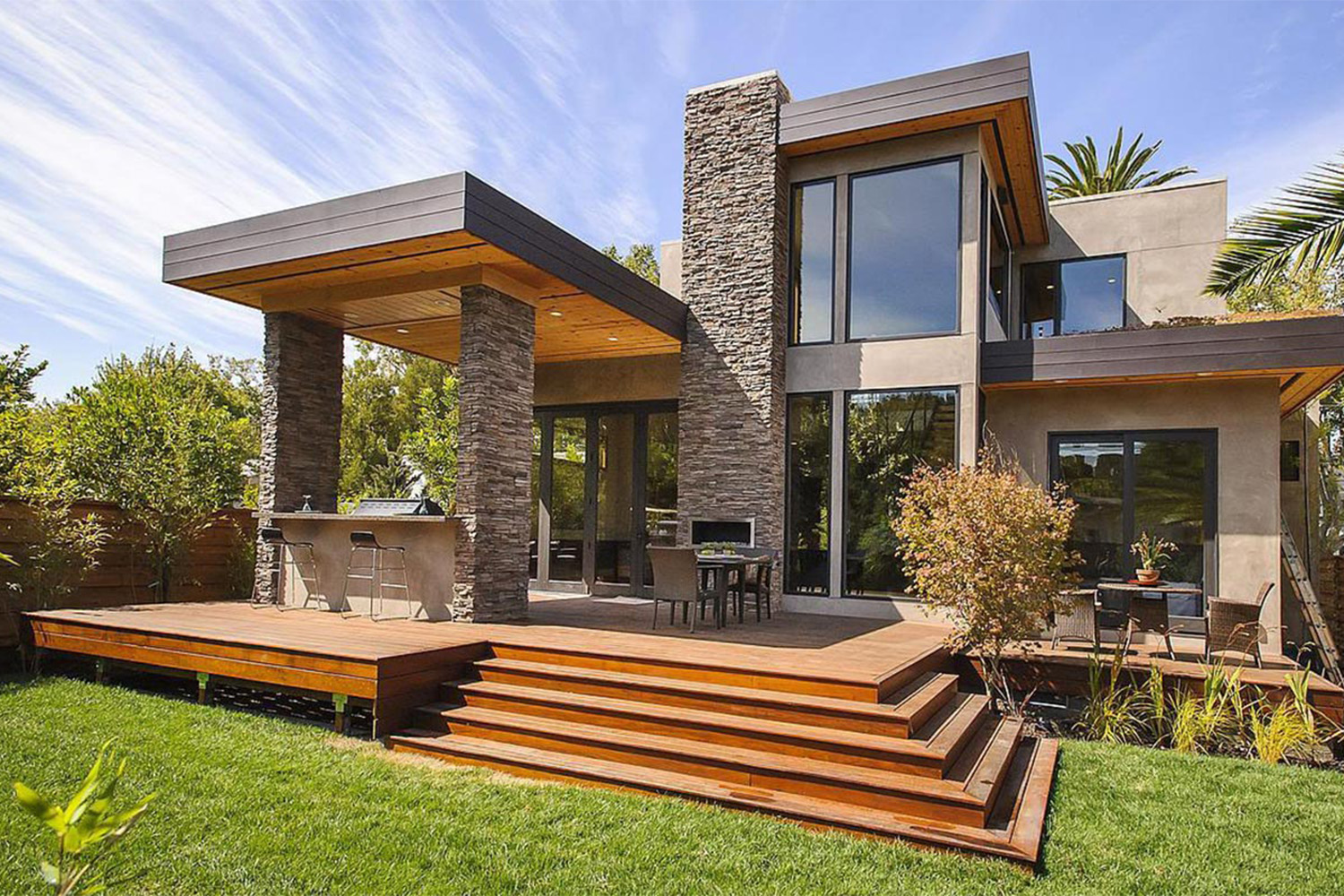 modular building with stone pillars, and modern stair set