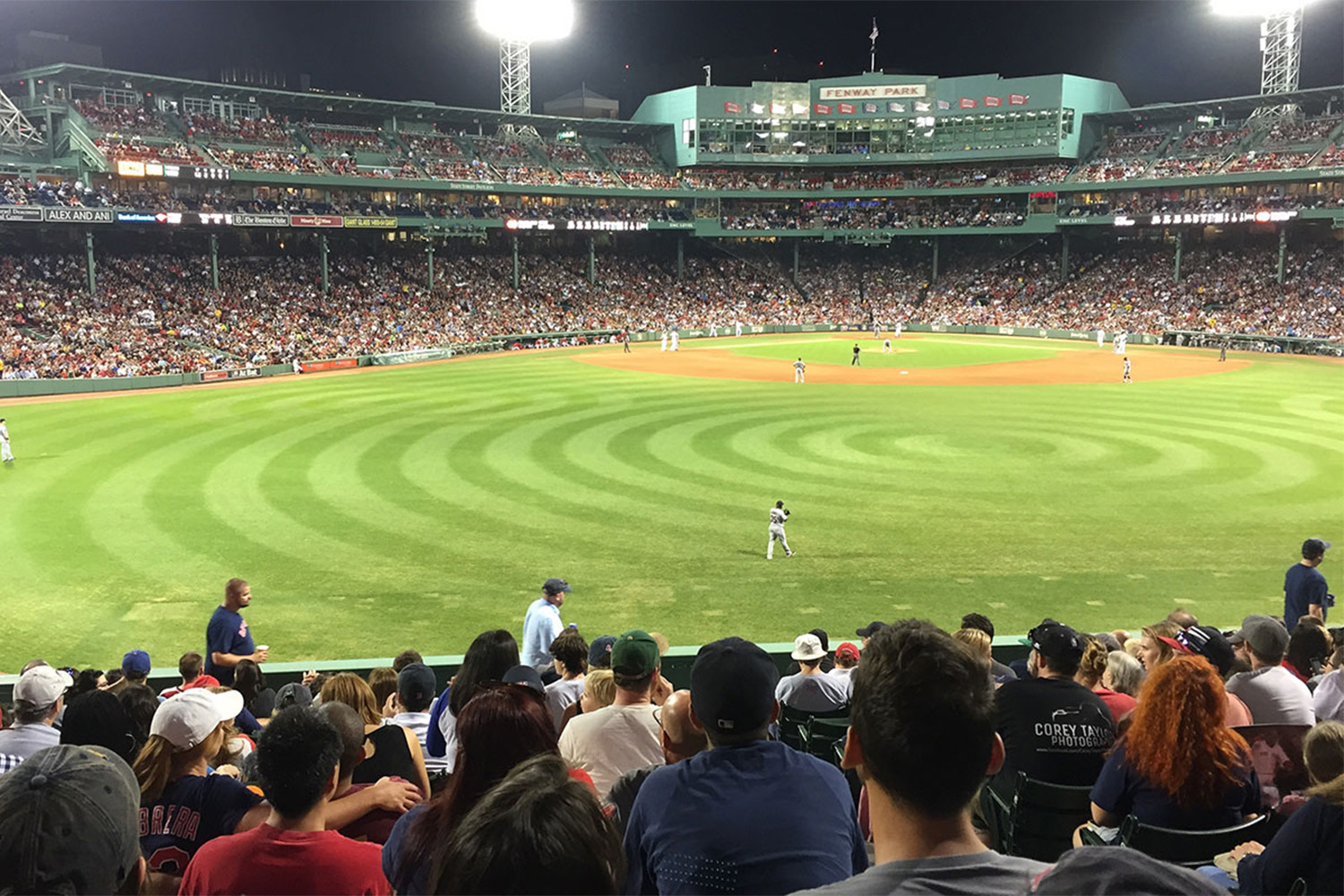 Fenway Park glistening under lights 