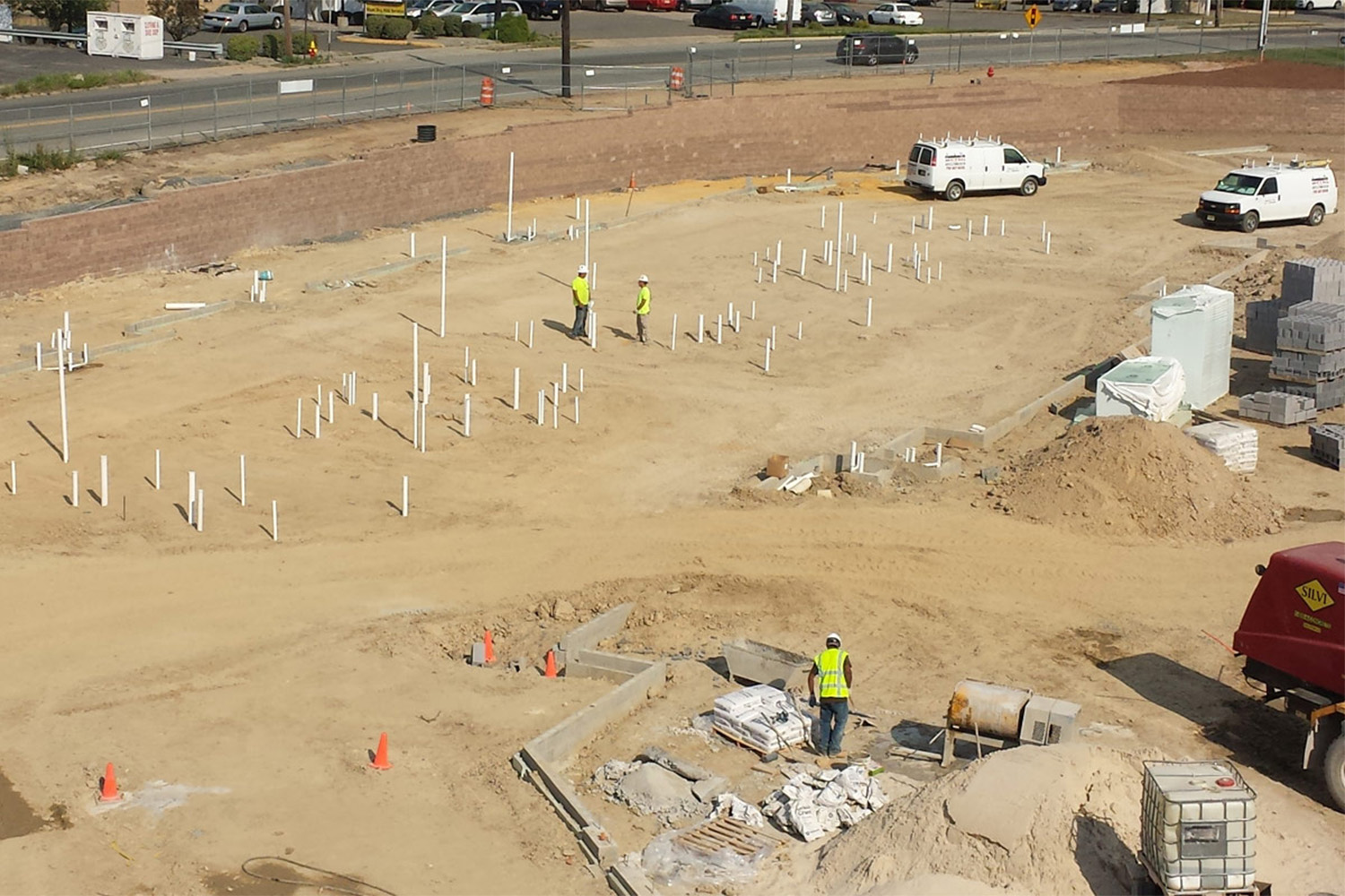 Layering up with the installation of underground plumbing.