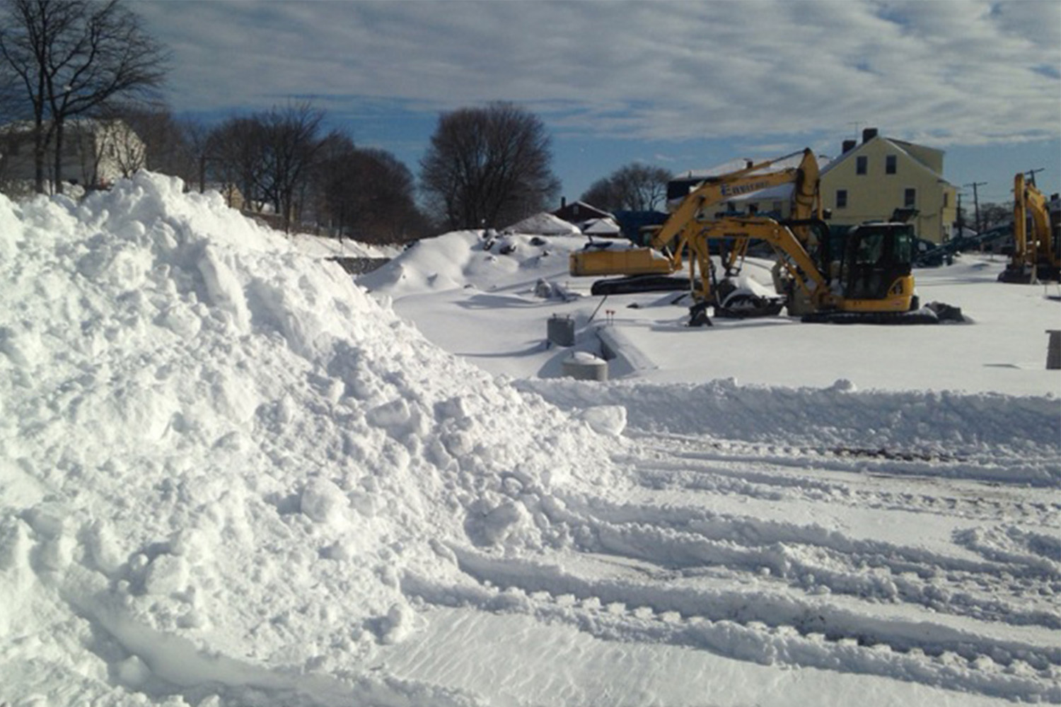 an excavator in the snow 