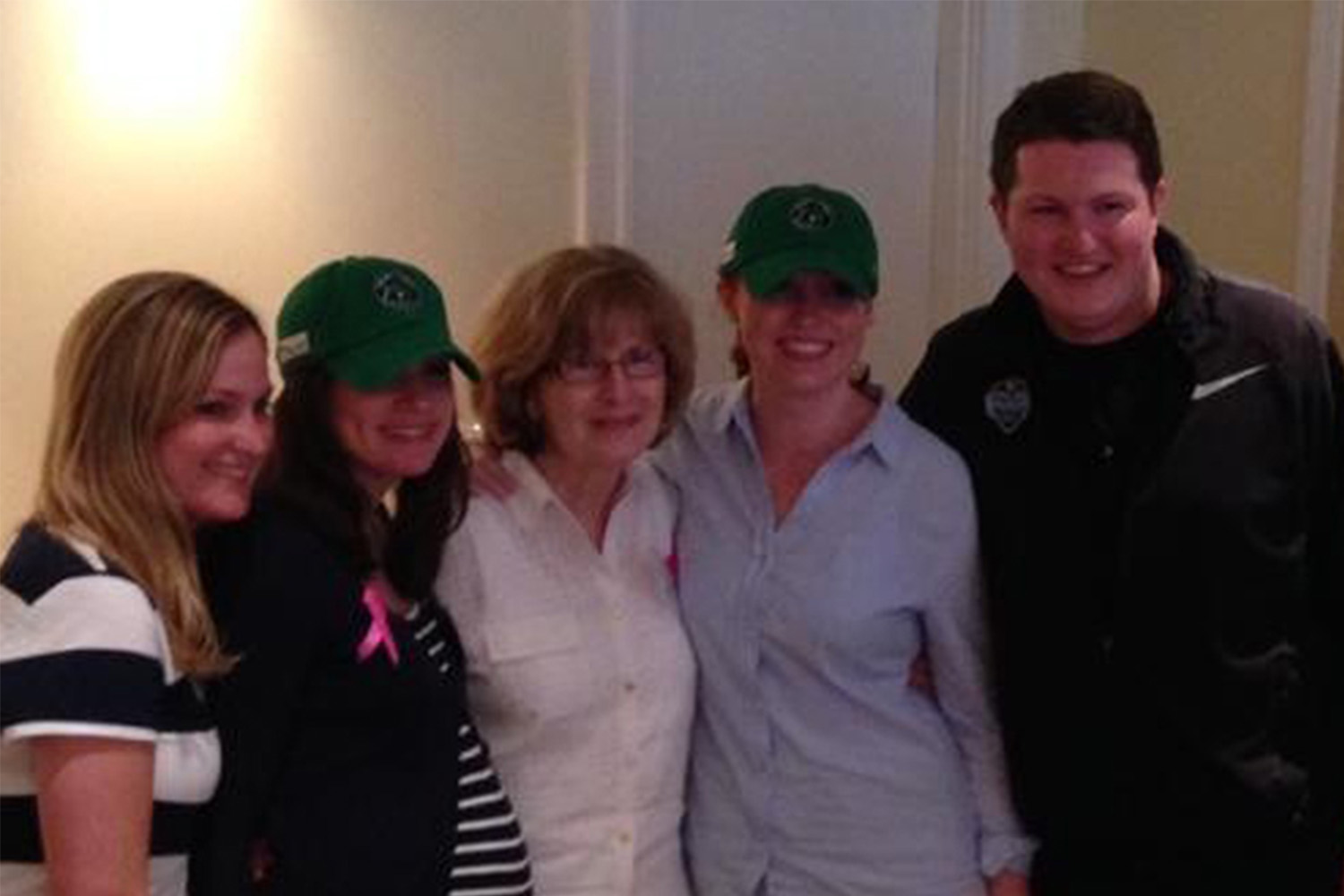 The Patterson family poses at the reception of their golf tournament fundraiser which donates all proceeds to the Jimmy Fund in honor of their father Mike Patterson.