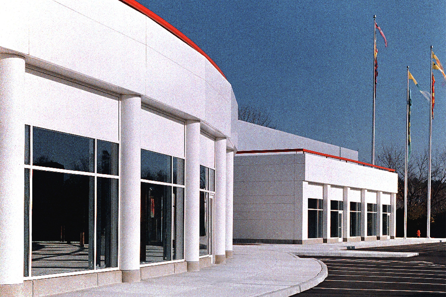 external view of 475 Winter Street office building, with flags out front