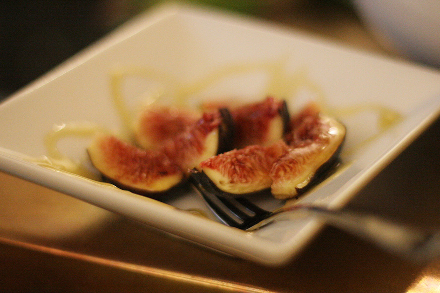 Figs fresh from the tree, drizzled with honey.