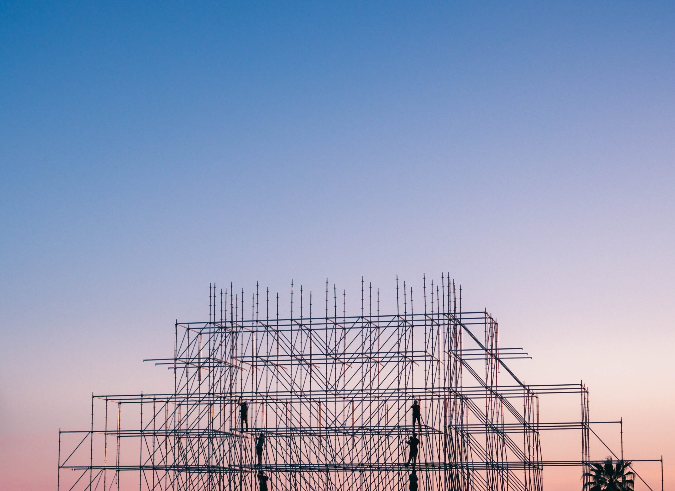 a structure made of steel beams, seen in the distance 