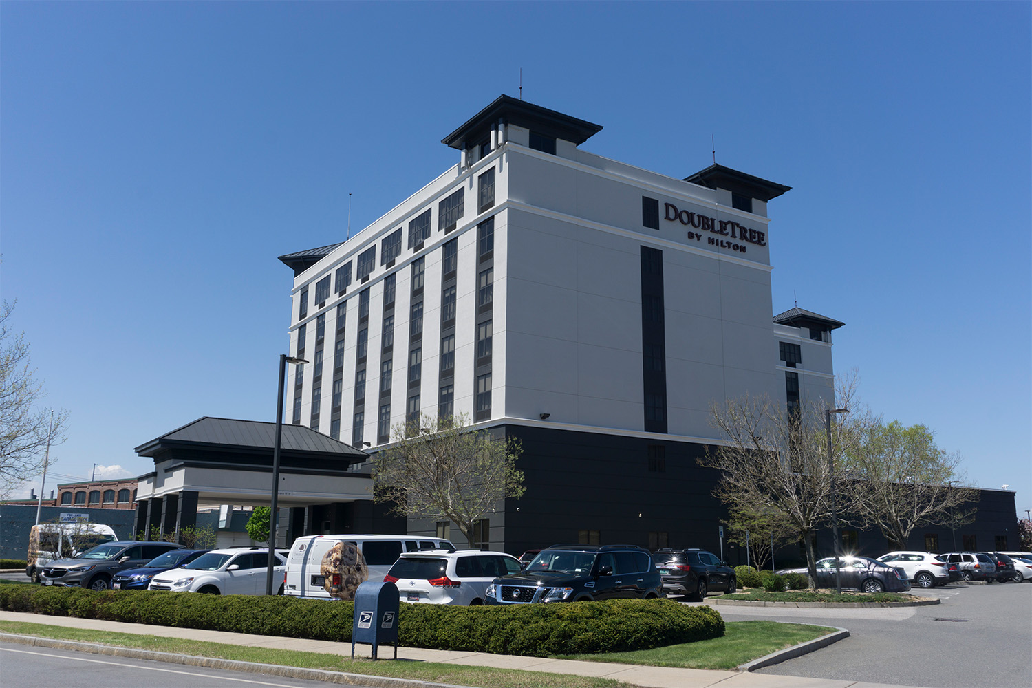 the exterior of the DoubleTree hotel, on a bright sunny day 