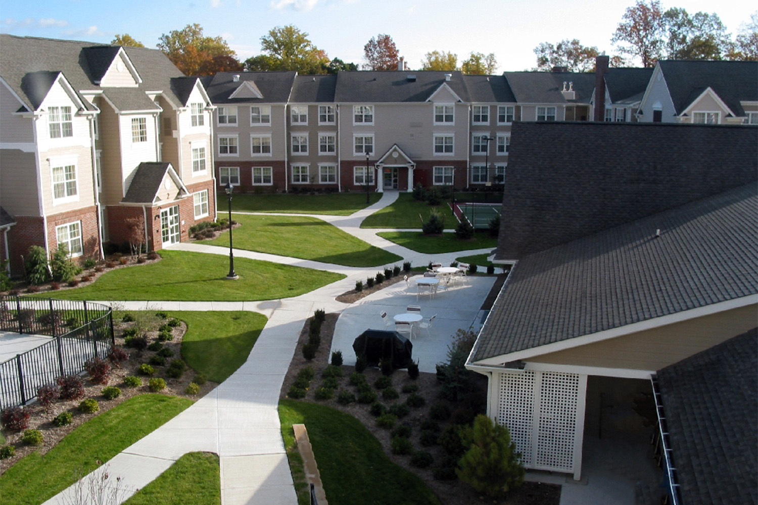 The Residence Inn hotel courtyard - complete with walkways and lush green grass 