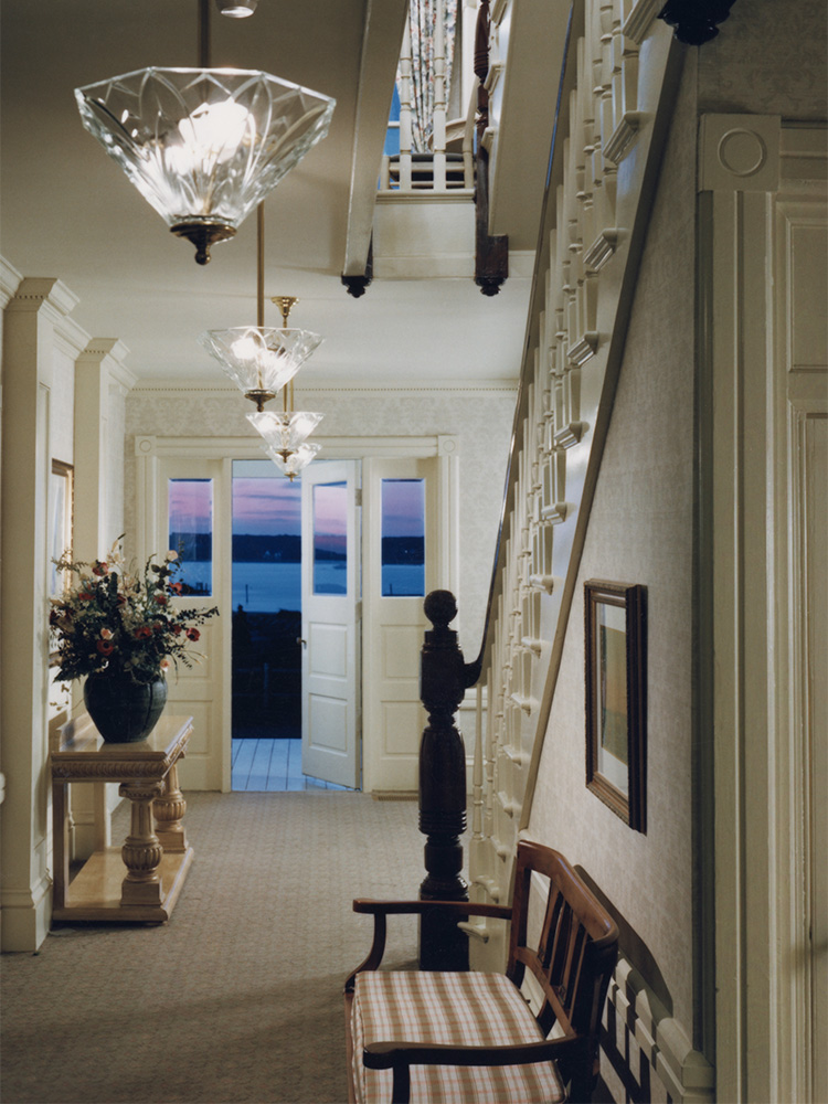 reception area of hotel, next to bench and stairwell 