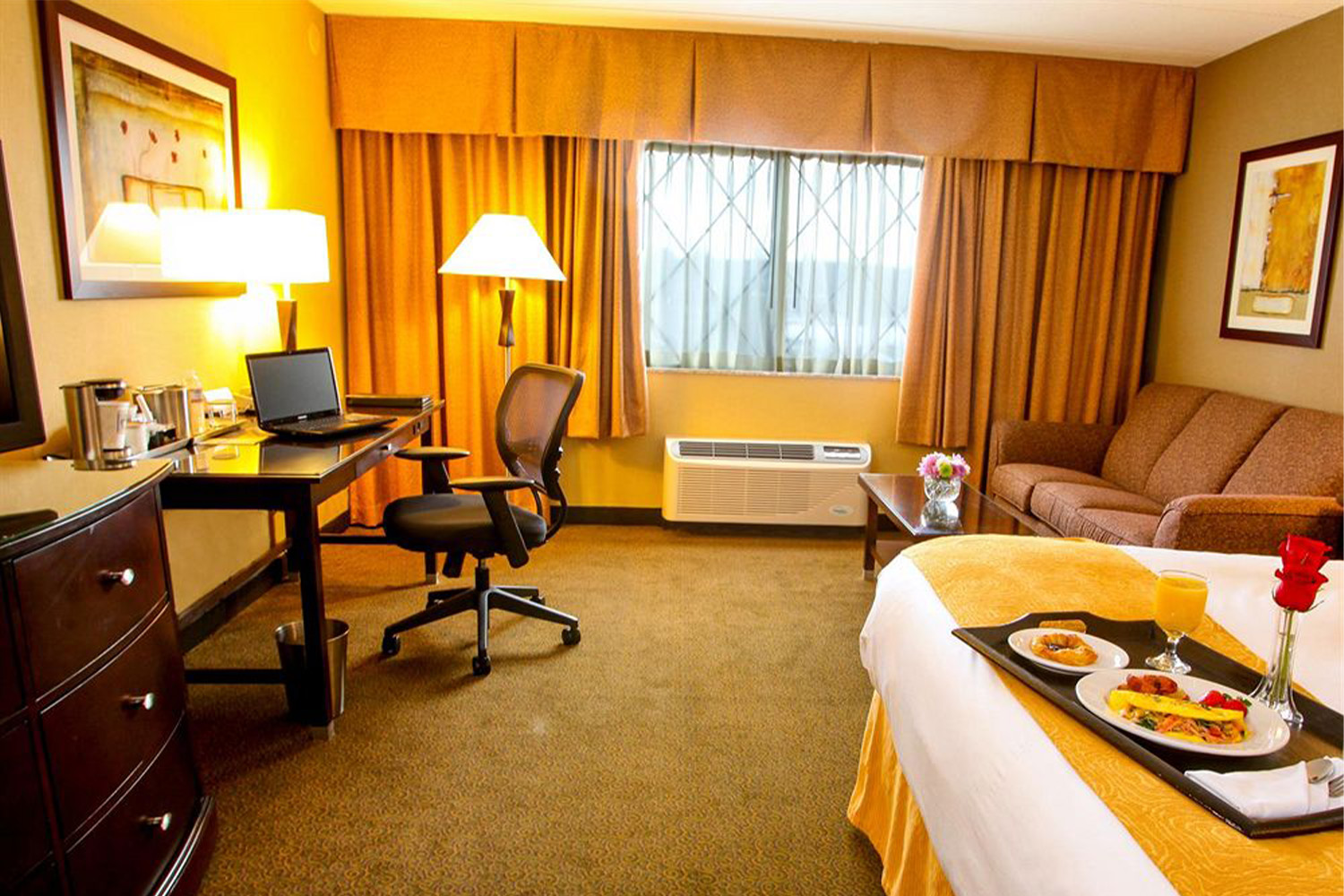 bedroom with yellow walls and window blinds 