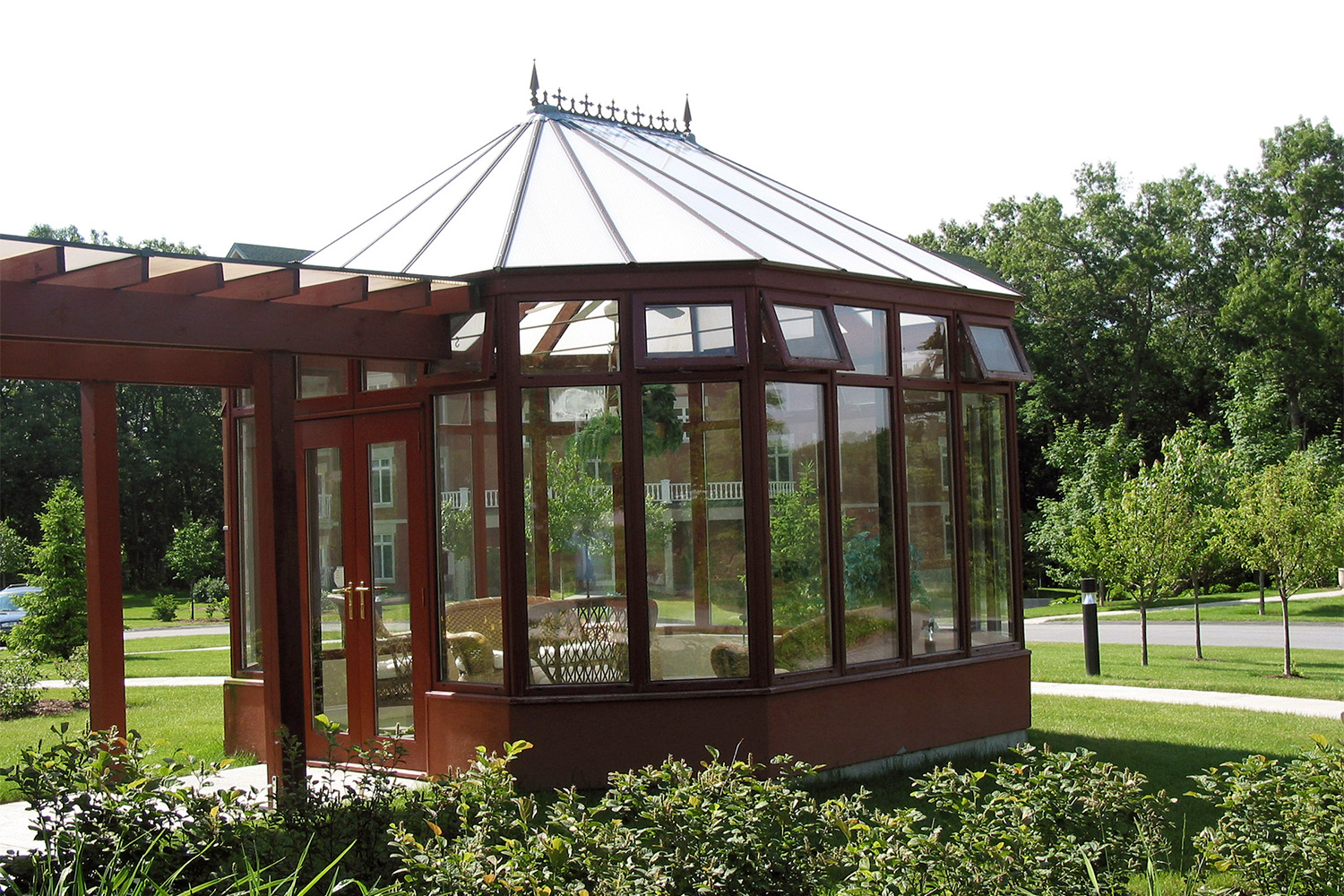 mahogany wood gazebo seen outside 