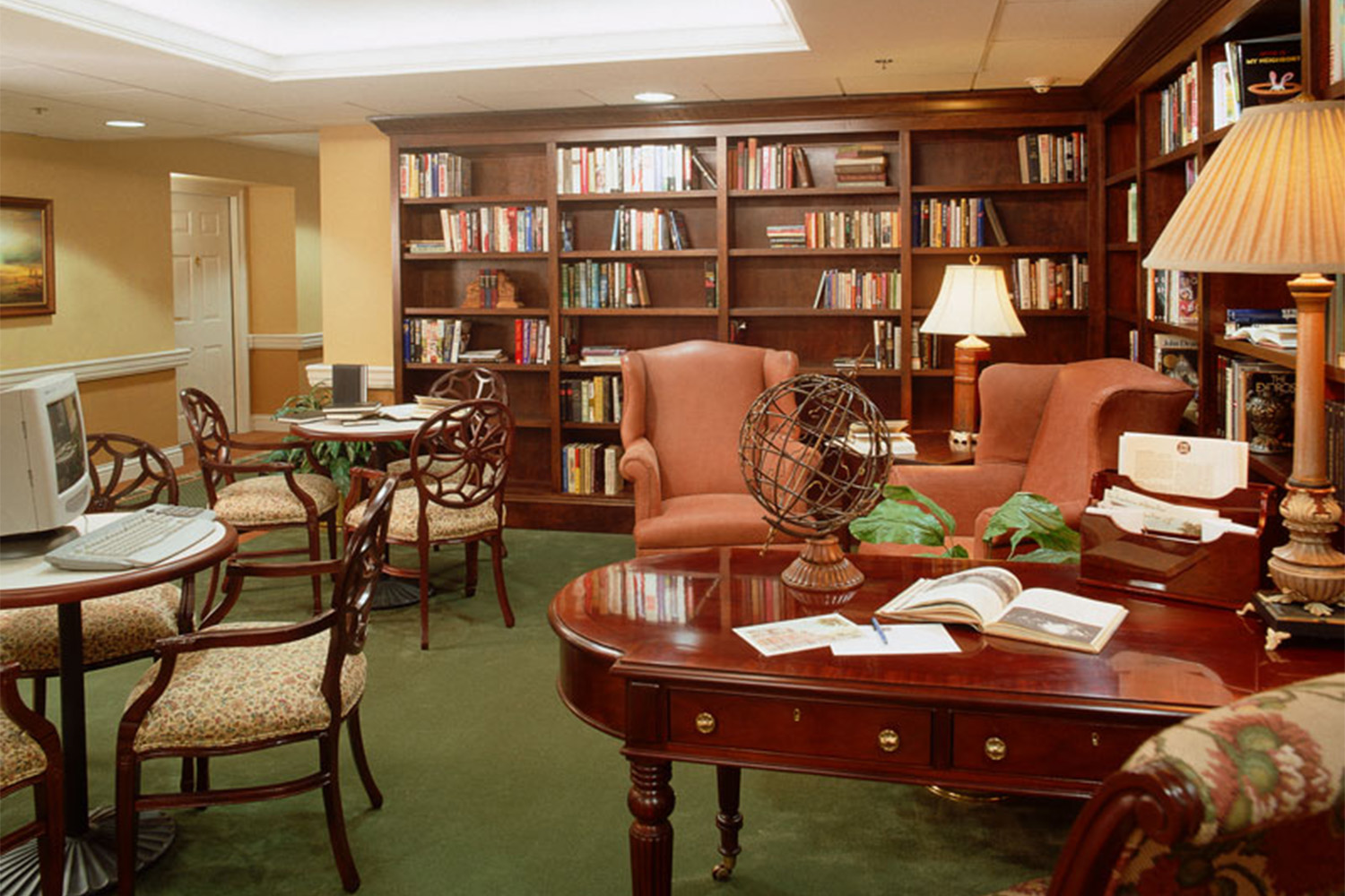 computer café area with mahogany piano to the right 