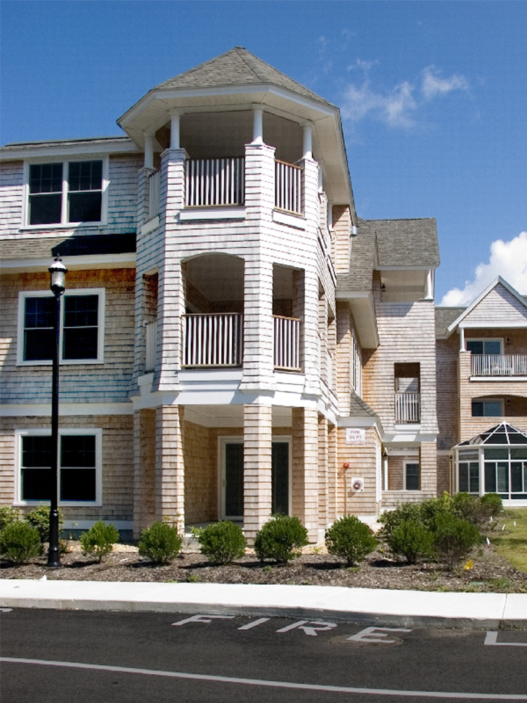 zoomed in view of tower at Dillingham Place, seen from the street 