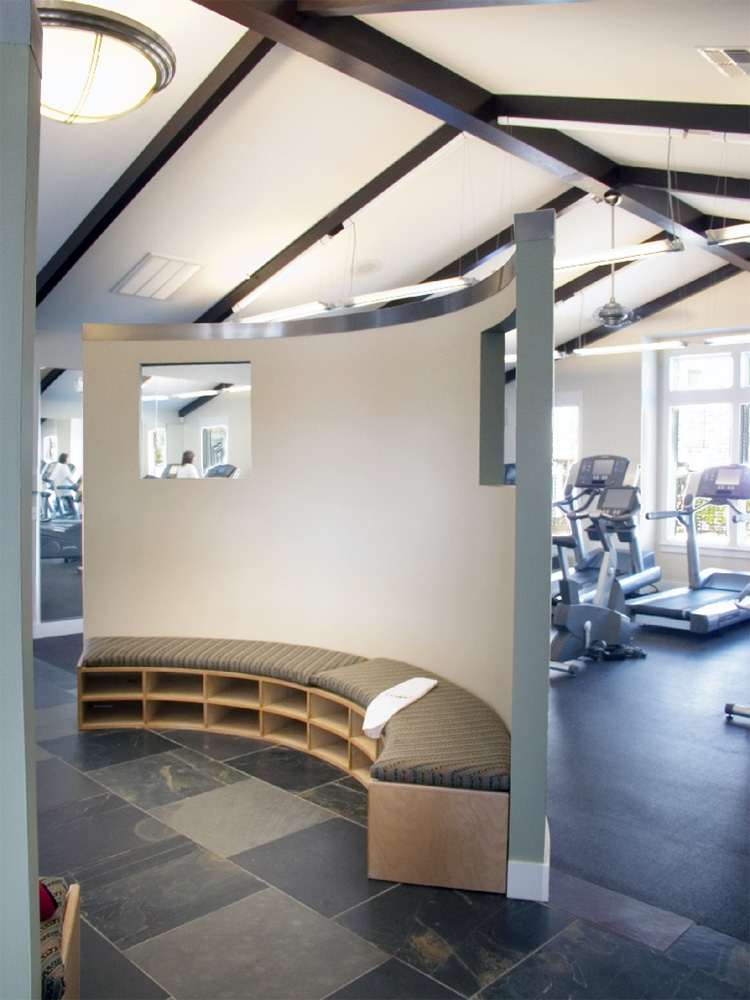 view on curved bench in front of gym area 