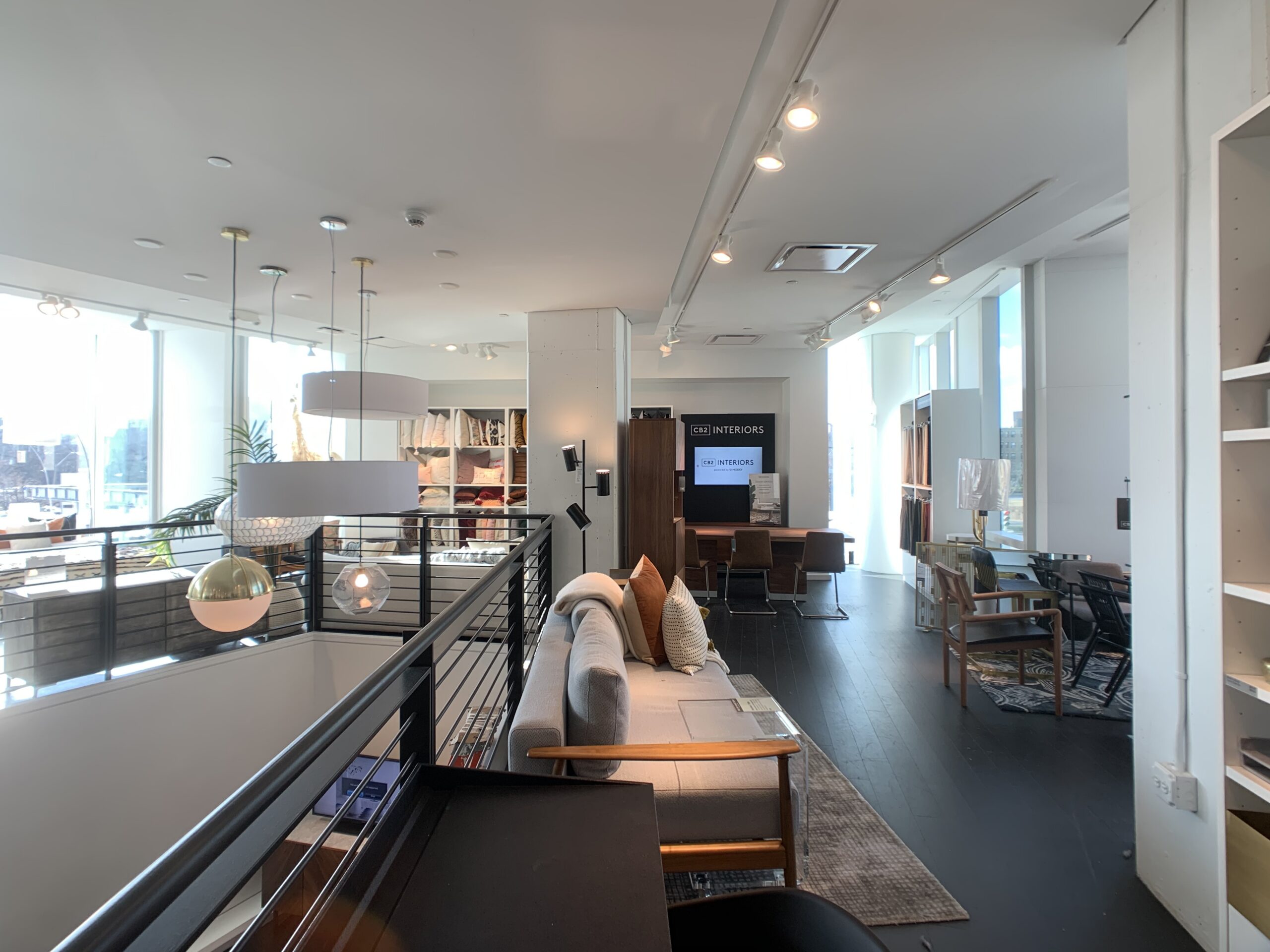 Photo of a CB2 Interiors furniture showroom mezzanine level.